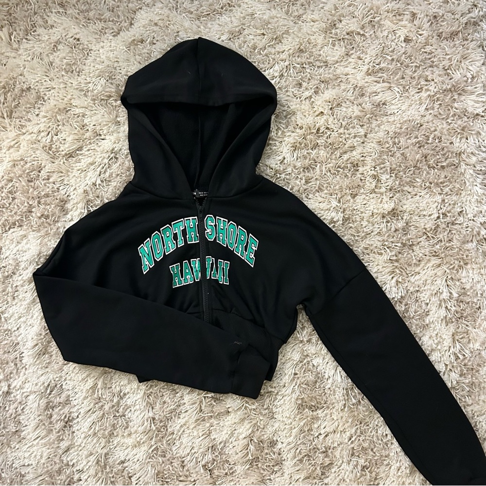 North Shore Hawaii cropped, fitted, zip up hoodie in black and green.